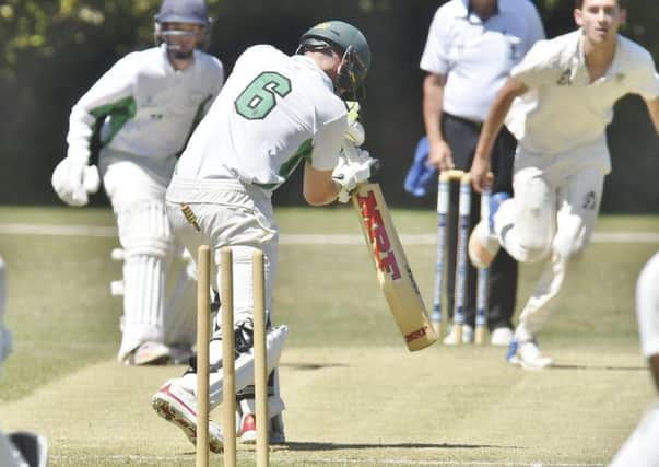 Castor's Mark Wheat is bowled during the game against Cambridge Granta. Picture: David Lowndes