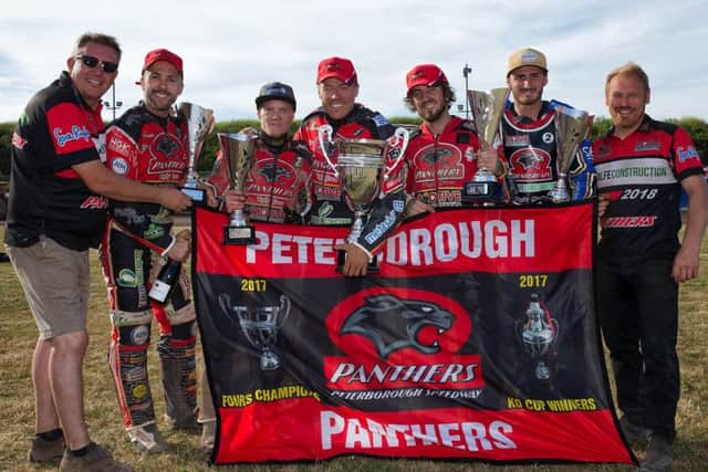 Peterborough Panthers, from the left, owner Ged Rathbone, Scott Nicholls, Michael Palm Toft, Ulrich Ostergaard, Bradley Wilson-Dean, reserve Ellis Perks and team manager Carl Johnson, celebrate their Fours success. Picture: COLIN POOLE.