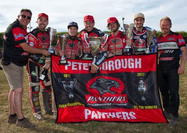 Peterborough Panthers, from the left, owner Ged Rathbone, Scott Nicholls, Michael Palm Toft, Ulrich Ostergaard, Bradley Wilson-Dean, reserve Ellis Perks and team manager Carl Johnson, celebrate their Fours success. Picture: COLIN POOLE.