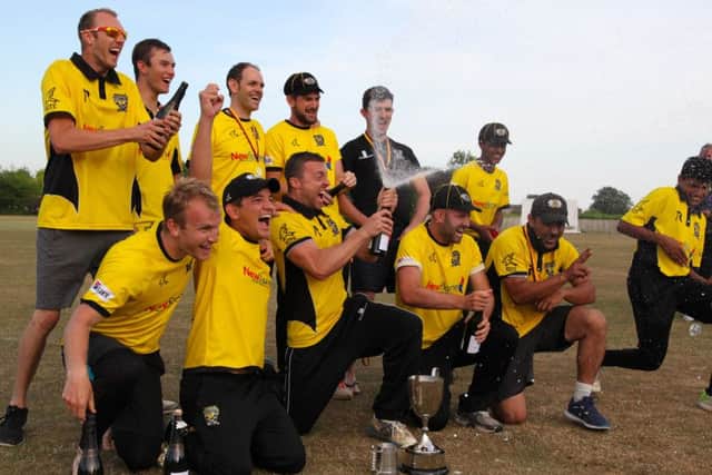 Peterborough Town celebrate their Northants T20 Championship success at Bretton Gate. Photo: Martin Green.