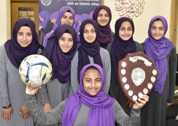 The successful Iqra Academy football team. They are Aisha Jaral, Khadij Jaral, Maya Alhamoud, Morna Tourasi, Eimaan Arif, Bayan Alwadi, Amneh Alkahil and Omaya Altaf.
