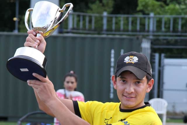 Peterborough Town skipper David Clarke with the Northants T20 Championship. Photo: Martin Green.