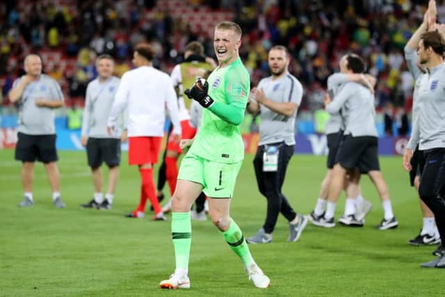 Goalkeeper Jordan Pickford celebrates England's win over Colombia.