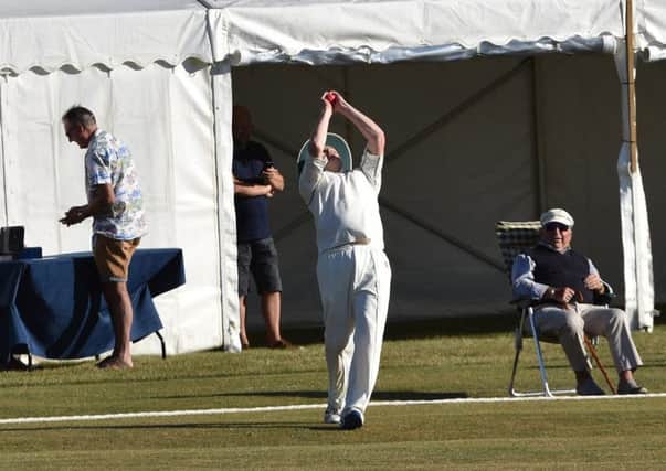 Richard Morris of Nassington takes the boundary catch that won him a bottle of champagne. Photo: James Biggs photography.