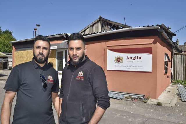 Kosir Aziz and Shahzad Hamid, joint directors of Anglia Laundry Services in Cobden Street -  which has been gutted by fire EMN-180307-161545009