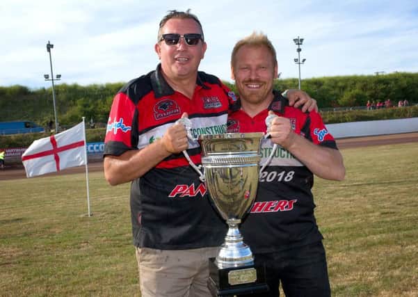 Panthers owner Ged Rathbone and team manager Carl Johnson with the Fours trophy. Picture: Colin Poole