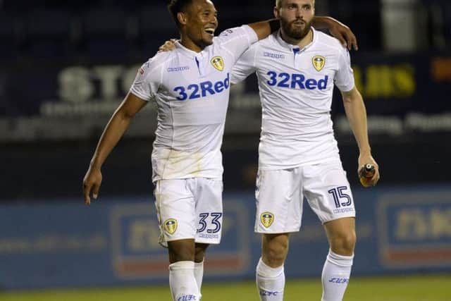 Tyler Denton (left) after scoring for Leeds against Luton.