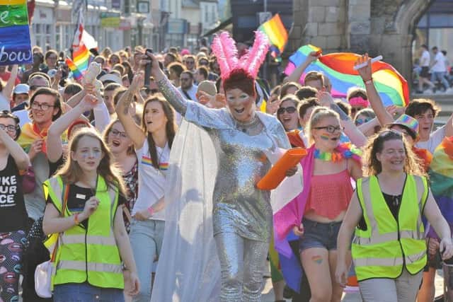 Peterborough Pride march through the city centre