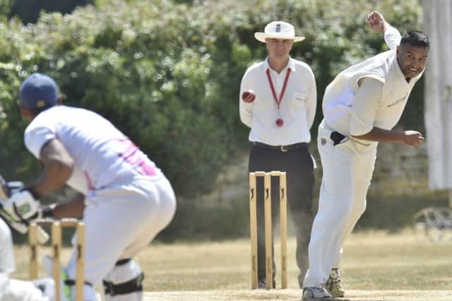 Ajaz Akhtar bowling for Barnack against Ketton Sports. Photo: David Lowndes.