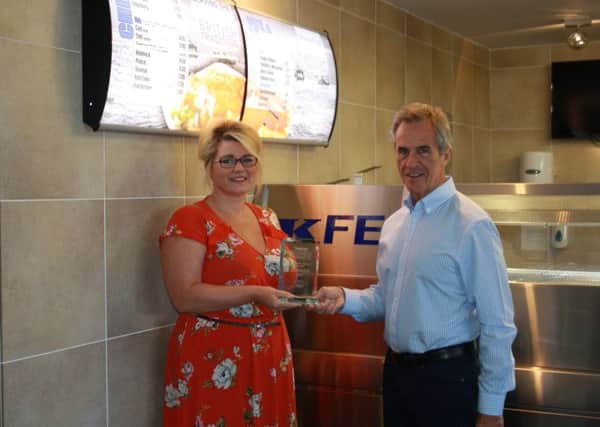 Paul Fieldhouse with Tanya Henderson from Market Deeping based KFE, Customer Service Award winners in 2017,