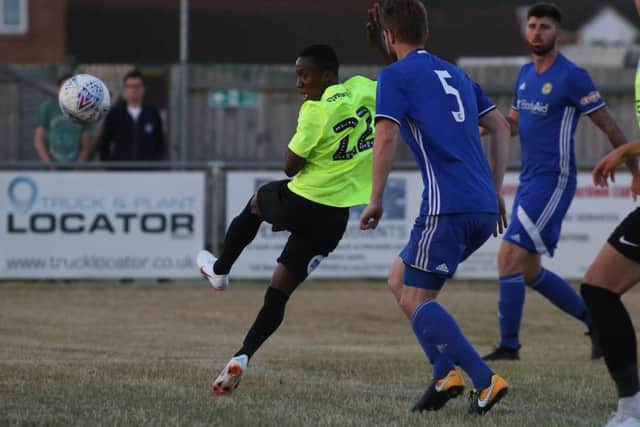Siriki Dembele scores his second goal for Posh at Peterborough Sports. Photo: Joe Dent/theposh.com.
