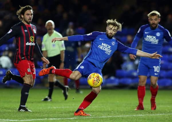 Posh midfielder Gwion Edwards has completed his move to Ipswich Town.