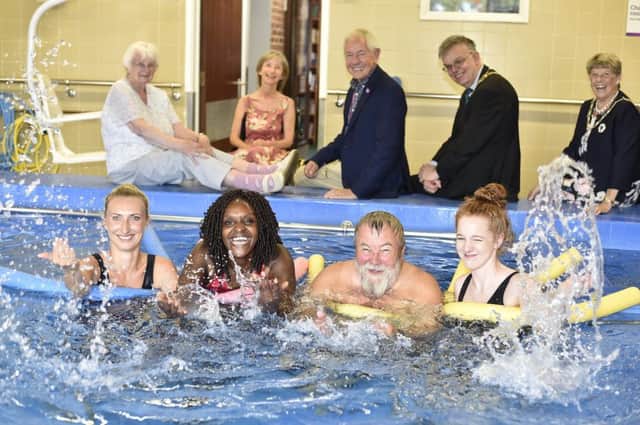 MP for Peterborough Fiona Onasanya and Deputy Mayor Coun. John Fox visiting the St George's hydotherapy pool with Vivicy staff  Courtney Hammond and Kasia Odrzywolek EMN-180717-125404009