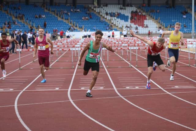 Freddie Fraser wins his gold medal at the English Schools Championship. Photo; Robert Windle Photography.