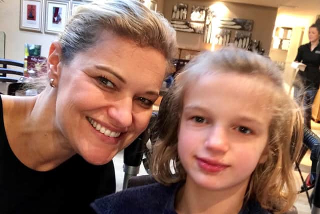 Holly, and mum Fiona, receive 15.48 million from the NHS