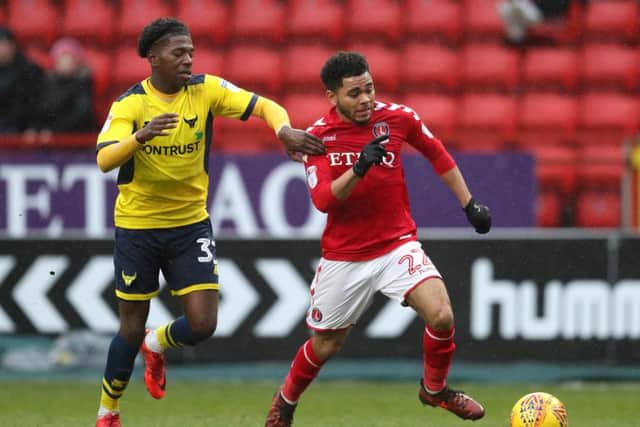 Isaac Buckley-Ricketts (left) playing for Oxford last season.