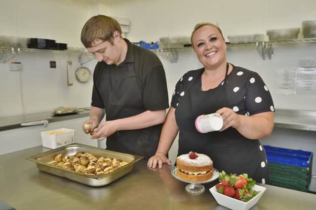 Charis Wedgwood, owner of Chef de la Maison, right, with a member of staff. EMN-181007-163549009