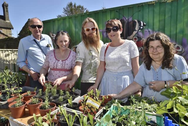 Re-launch of the new Green Back Yard produce shop -  looking at some of the plants for sale -  Robbie Stainton, Pru Kerr, Dan Kerr, Sarah Middleton and Barbara Stainton EMN-180505-175216009