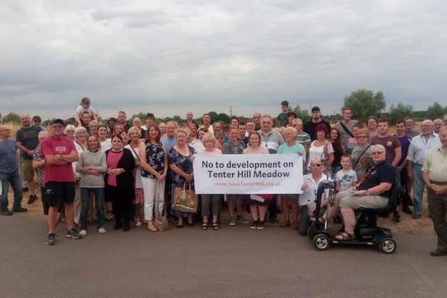 Protesters gathered to object to housing plans on Tenter HillMeadow, Peterborough
