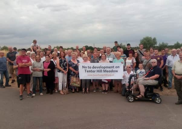 Protesters gathered to object to housing plans on Tenter HillMeadow, Peterborough