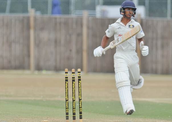 Peterborough Town's Danny Malik is run out for 42 against King's Keys. Malik went onto take 7-47. Photo: David Lowndes.