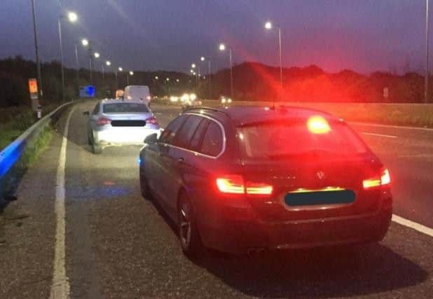 What should you do if you think the undercover police car isn't genuine?