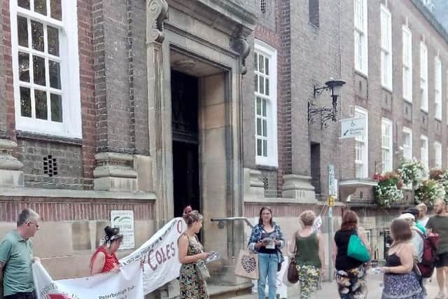 Protesters outside the Town Hall before the Full Council meeting