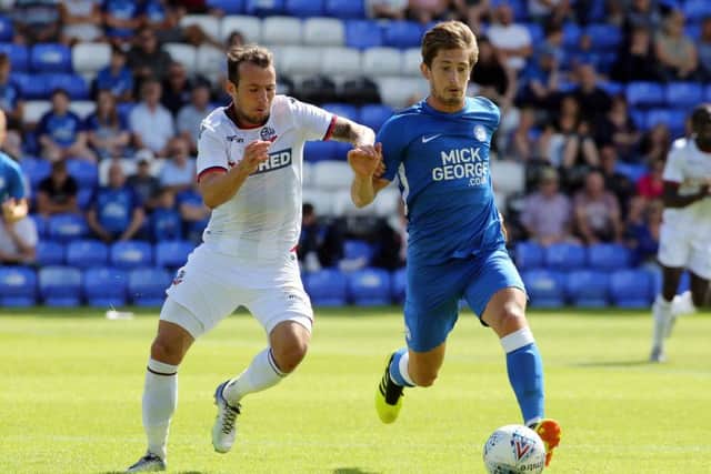New Posh skipper Alex Woodyard in action against Bolton. Photo: Joe Dent/theposh.com.