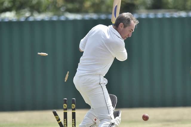 Nassington's Dan Anslow is bowled for 16 in an abandoned Hunts Division Two match at home to Barnack. Photo: David Lowndes.