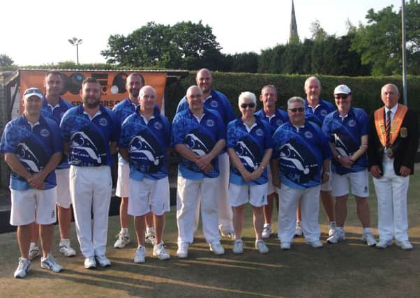 The Parkway team lifted the Dan Duffy Trophy for the second year running to qualify for next years Durham Centenary Trophy. (Back row, left to right): Paul Dalliday, Neil Wright, Lee Welsford, Trevor Collins, Tony Scarr. (Front) Brian Martin, Simon Law, Stuart Reynolds, Howard Shipp, Pat Reynolds, Fred Addy, Mike Robertson, Tony Mace (county president).