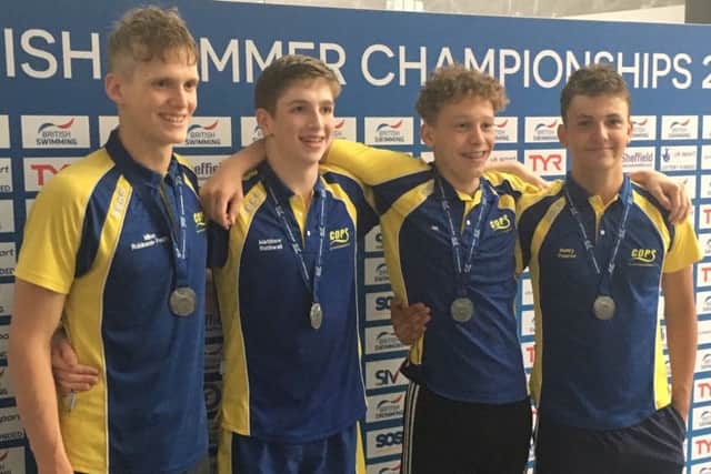 The COPS 4x200m freestyle relay team that won silver. From the left are Myles Robinson-Young, Matthew Rothwell, Herbie Kinder and Henry Pearce.