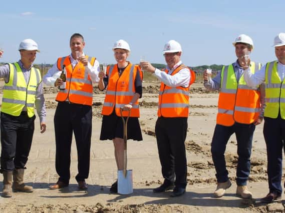 The ground-breaking ceremony as work starts on a new warehouse for Coloplast.
