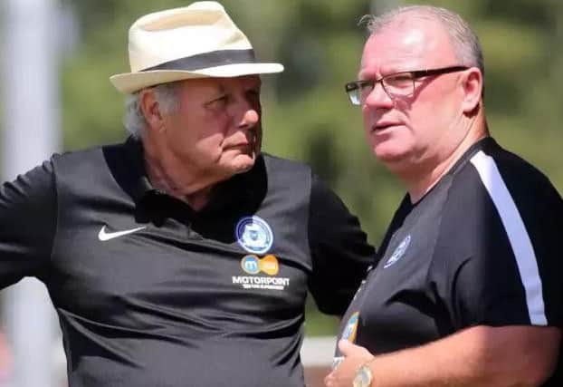 Posh manager Steve Evans (right) and director of football Barry Fry