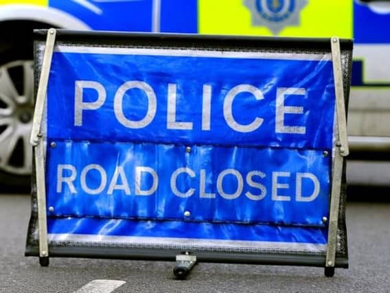 Road closed sign