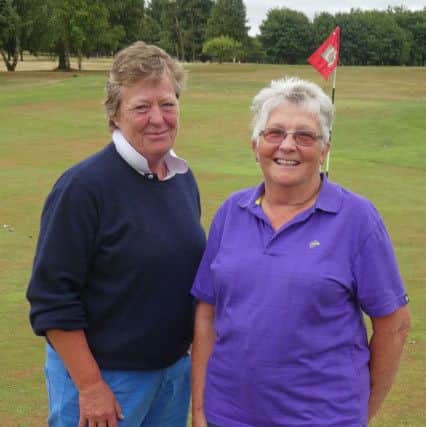 Burghley Park ladies club champion Nicky Plumtree (left) with net winner Sara Harris.