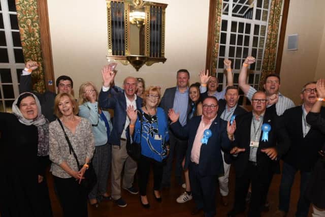 The Conservatives celebrate at the Town Hall