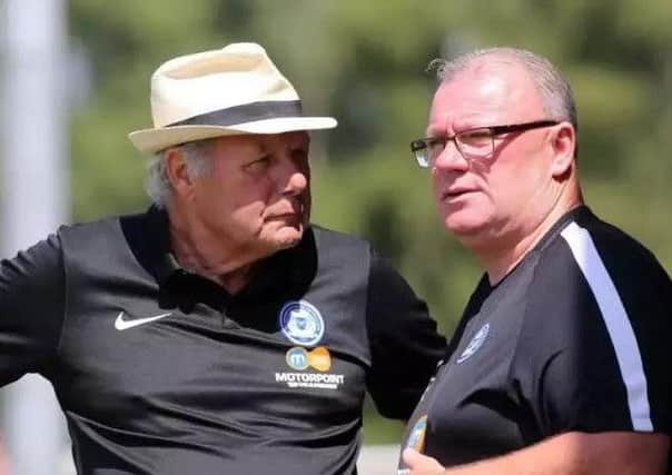 Posh manager Steve Evans (right) and director of football Barry Fry.