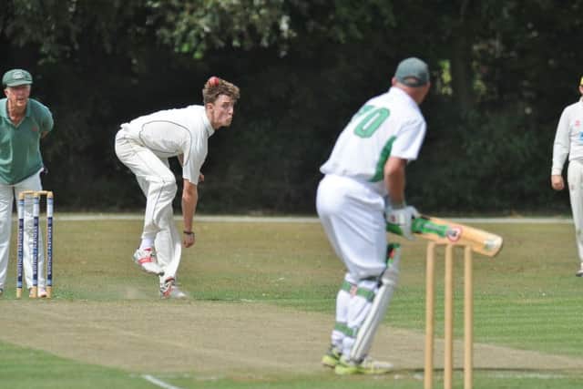 Alfie Coward bowling for Easton-on-the-Hill against Castor seconds. Photo: David Lowndes.