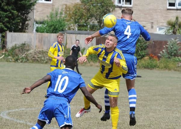 Action from ICA Sports (blue) 1, Moulton Harrox 4 in the Peterborough Premier Division. Photo: David Lowndes.