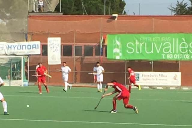 Adam Drake in action for England against Spain in the World  Hockey Over 45 semi-final.