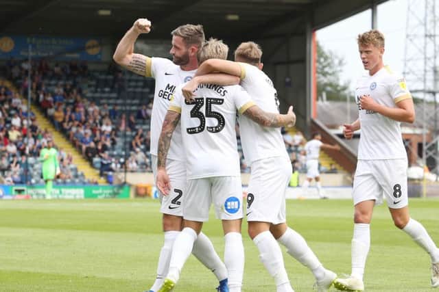 Posh celebrate Jason Cumming's equaliser at Rochdale. Photo: Joe Dent/theposh.com.