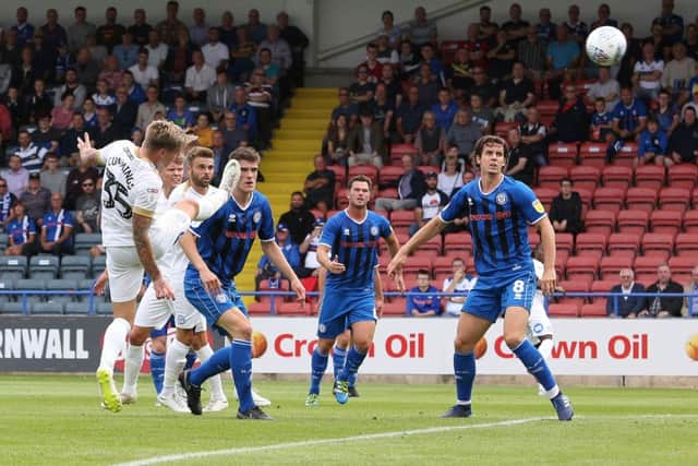 Jason Cummings heads home the Posh equaliser at Rochdale. . Photo: Joe Dent/theposh.com.