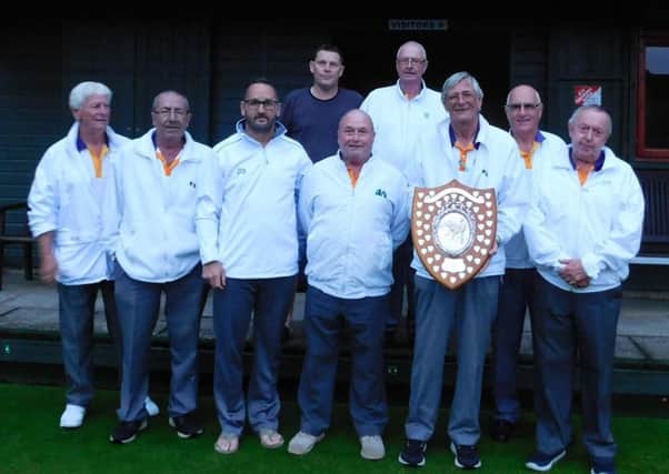 West Ward with the Munday Shield after their dramatic one shot victory. (Back row, from the left)  Dick Noble and Rod Maplethorpe. (Front row): Robin Wyld, Peter Jessop, Darren Lord, Phil Afford, Steve Johnson (with shield), Dave Hilton, Richard Day.