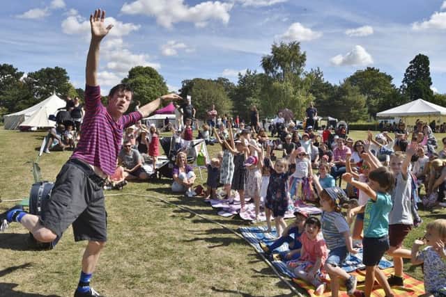 Storytelling Festival at Central Park. Dennis the storyteller entertains his audience Vivacity Once Upon a Festival EMN-181108-181108009