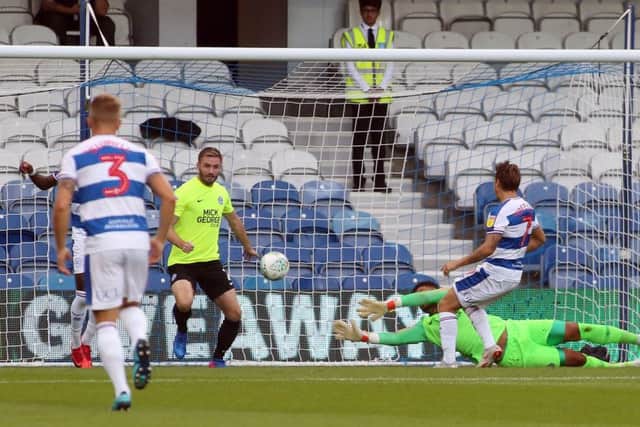 Luke Freeman of Queens Park Rangers score his side's opening goal of the game past Aaron Chapman of Peterborough United - Mandatory by-line: Joe Dent/JMP - 14/08/2018 - FOOTBALL - Loftus Road - London, England - Queens Park Rangers v Peterborough United - Carabao Cup