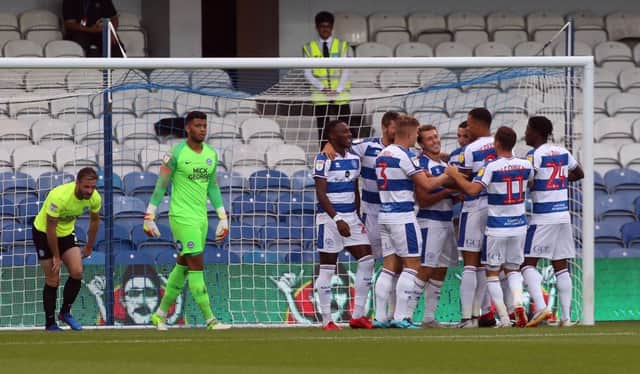 Luke Freeman of Queens Park Rangers (centre) is congratulated by team-mates after scoring his side's opening goal of the game - Mandatory by-line: Joe Dent/JMP - 14/08/2018 - FOOTBALL - Loftus Road - London, England - Queens Park Rangers v Peterborough United - Carabao Cup