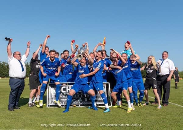 Yaxley FC celebrate their United Counties Premier Division title.