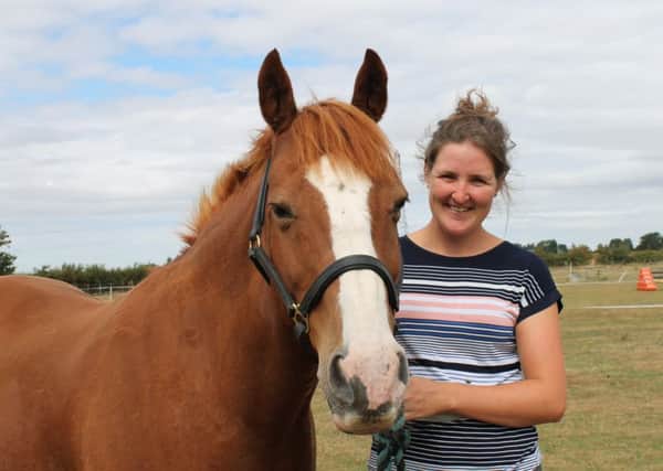 Bar Pasture Stables manager Laura Horrell with Sprite.