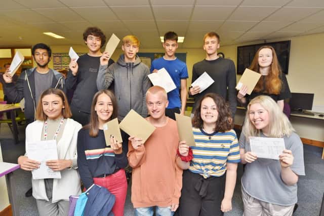 Pupils at Hampton College receiving their A-Level results last year EMN-170817-112528009
