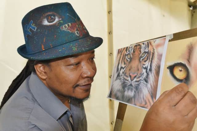 Artist Tony Nero at work.